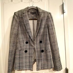 Black and white blazer. Very soft fabric. Fitted blazer. Small size. Brand new